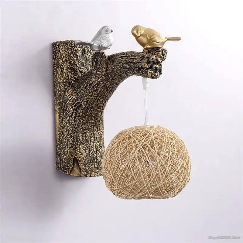 Remise Chinese style wall light with resin bird and rattan
