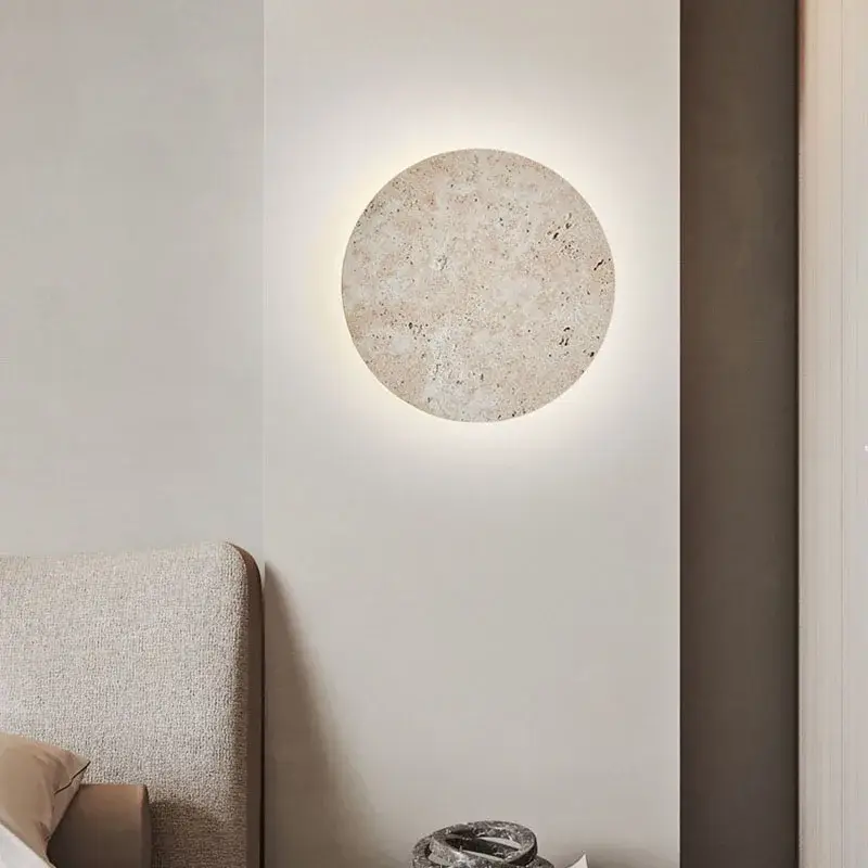 Authentique Round natural stone wall lamp artistic ambience