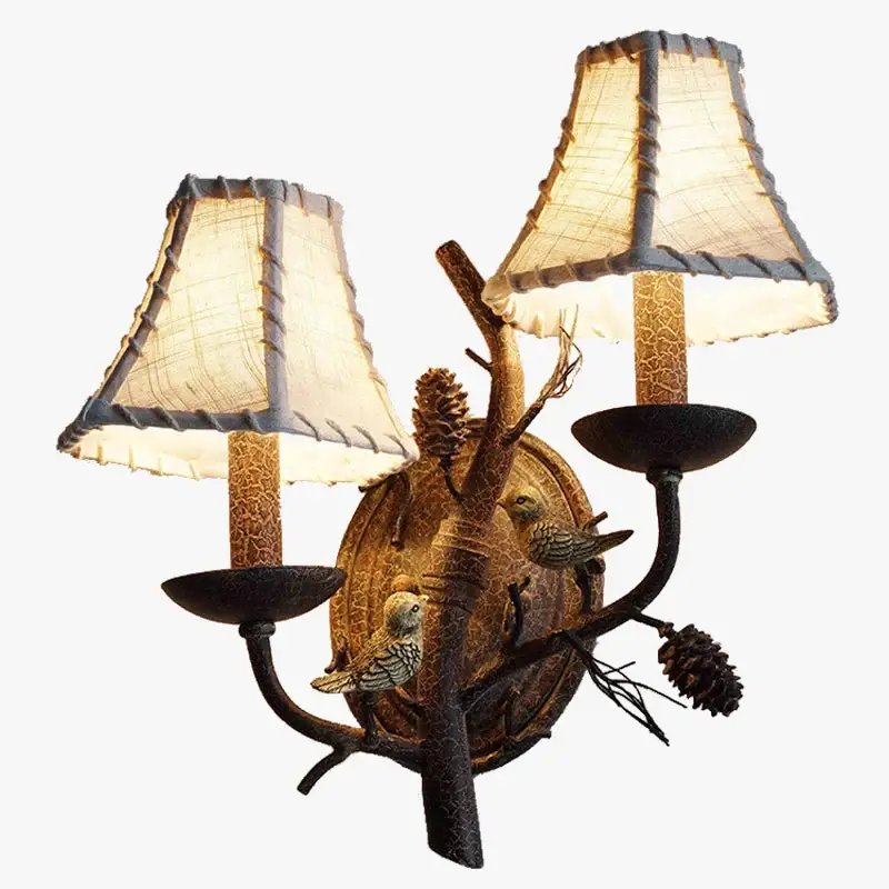 Marque Retro scottish wall light with bird and pine cone