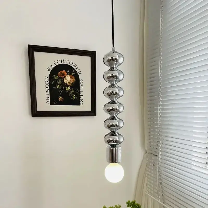 Modern industrial chrome bedside lamp with long wavy line Acheter Direct
