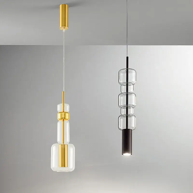 Dernière Chance Modern clear glass pendant light with gold and black metal