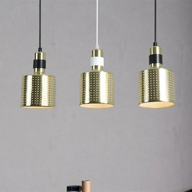 Nordic metal designer pendant light for modern interiors Commander Maintenant