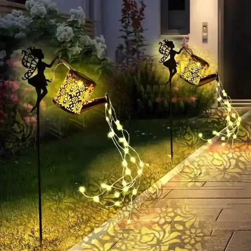 Solar watering can with garden lights and fairy statues Authentique
