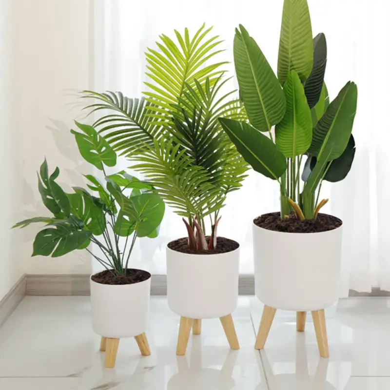 Round flower pot on wooden stand for plants Livraison Express