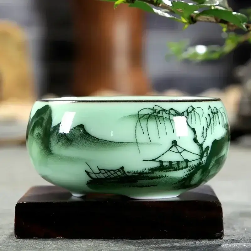 Hand-painted celadon teacup with lotus and carp Produit De Marque