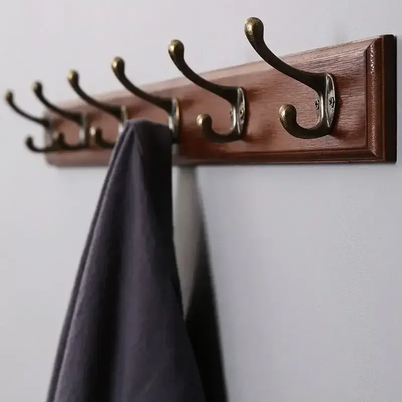 Satisfait Ou Remboursé Solid wood wall-mounted coat rack with decorative hooks and hangers