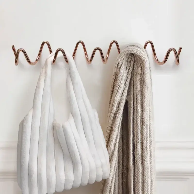 Wall hooks for bathrobes, towels and clothes, practical accessories Marque