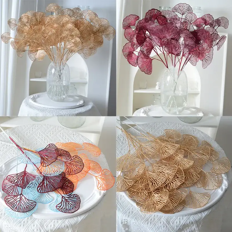 Set of artificial ginkgo, eucalyptus and holly leaves for floral de... Retour Gratuit