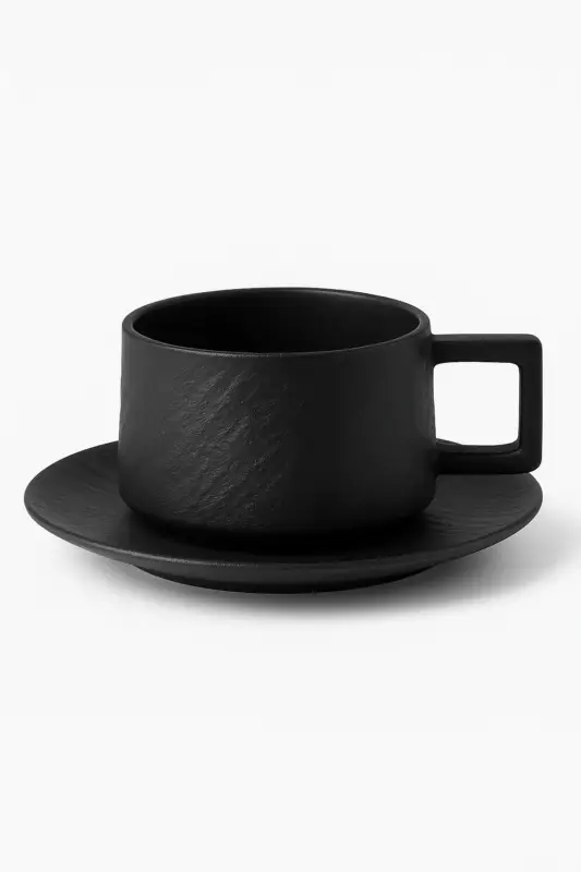 Satisfait Ou Remboursé Sand-style ceramic cup and saucer set with ergonomic handle
