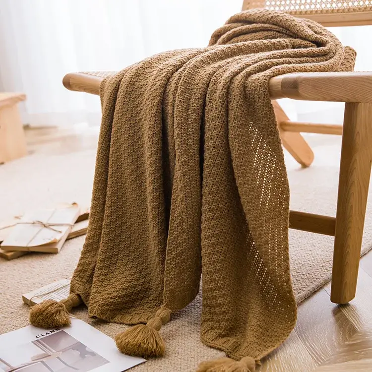 Chunky waffle knit throw with pom-poms nordic style Offre Limitée