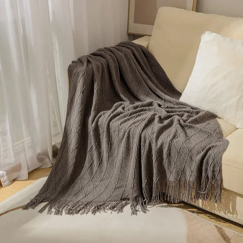 Quantité Limitée Soft knitted plaid with pom-poms, chequered style for sofa or bed