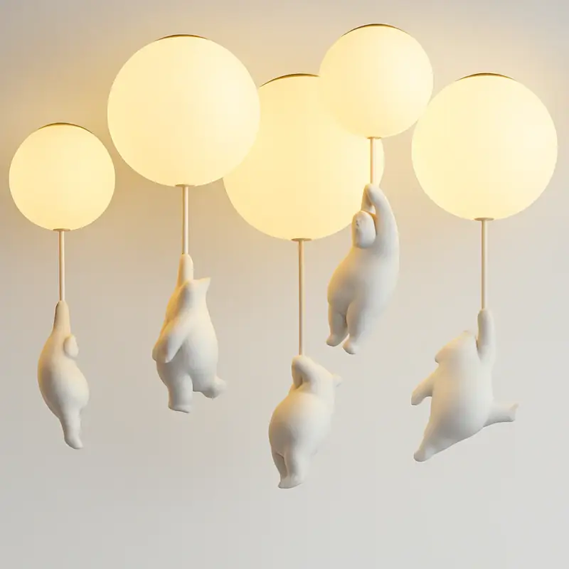 Pendant light with glass globe and hanging bear Certifié